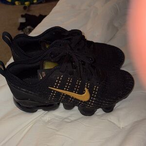 Nike Black and Gold Athletic Shoes